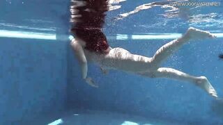 Diana Rius is swimming absolutely exposed, not knowing about a hidden camera in the swimming pool